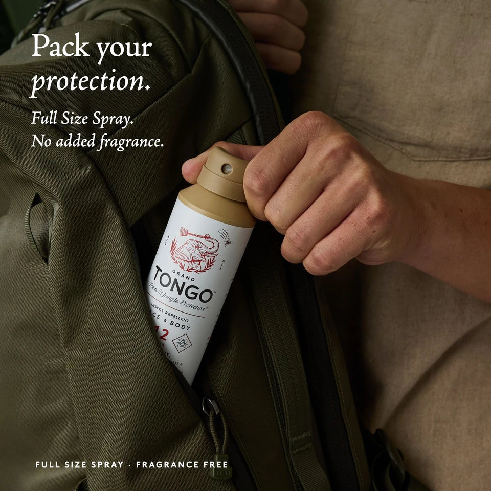 A hand packs genuine Fragrance Free Full Size Spray into an olive backpack. Pack your protection. Full Size Spray. No added fragrance.